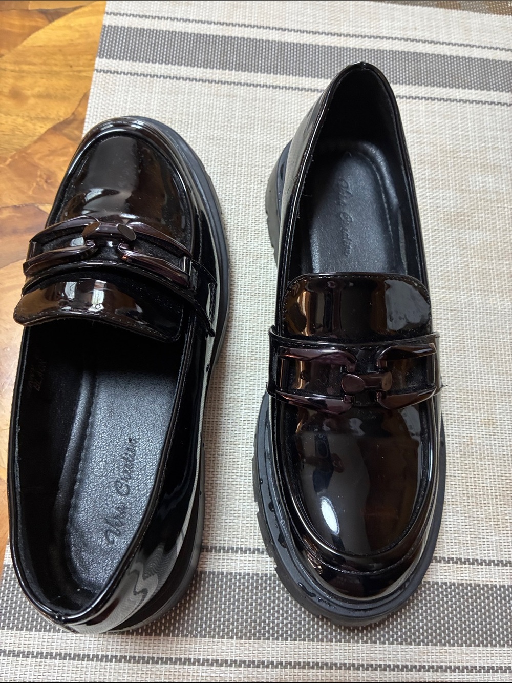 Patent Penny Loafers in black Classic Slip-On Flats